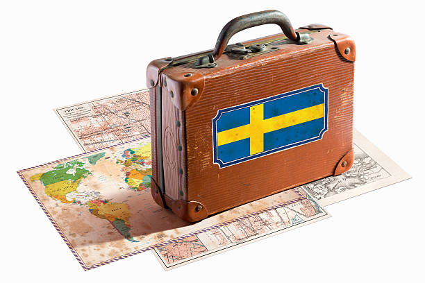 istock Antique leather suitcase with Sweden flag on maps 468161779
