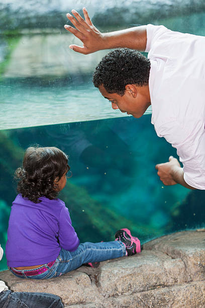 istock Father and daughter at zoo 468162837
