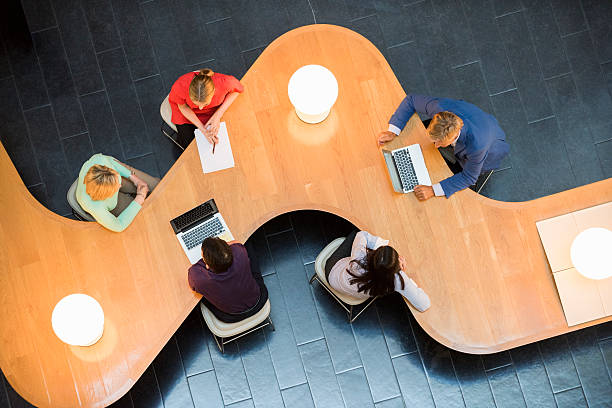 istock Business people at modern conference table 468170188