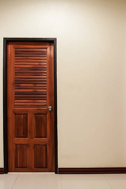 istock door in white room. 468170735
