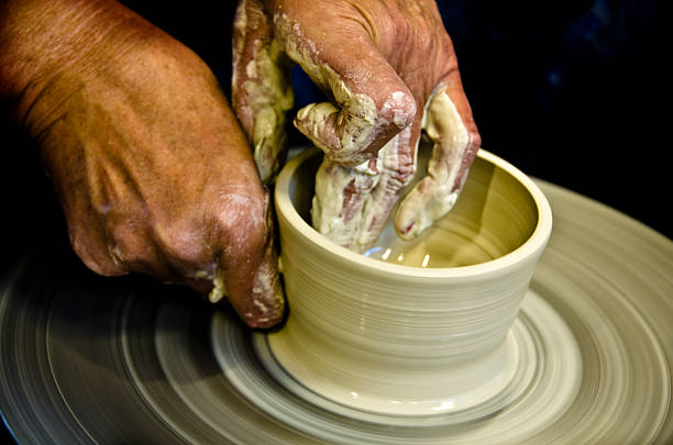 istock Potter makes a jug out of clay 468172819