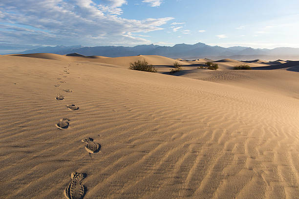 istock Sand Dunes with Foot Prints 468177090