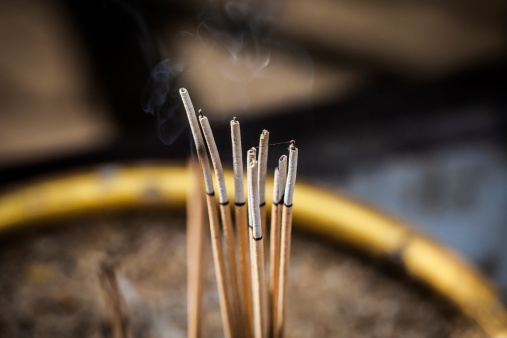 Macro shot of matchsticks coming out of the box to burn paper, matches stick on paper