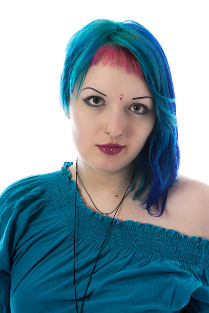 istock Alternative model in teal off-shoulder blouse. 468178753