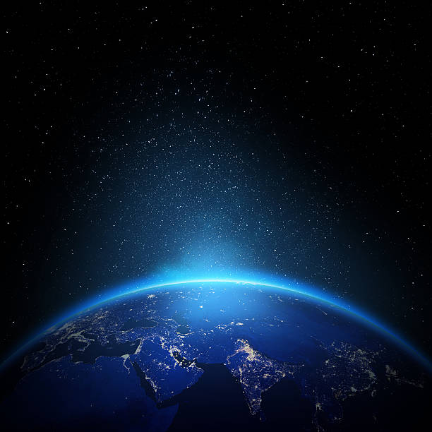 Earth at night with city lights stock photo