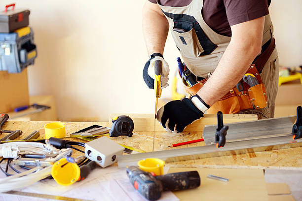 istock Male carpenter in working clothes in a construction workshop 468190460