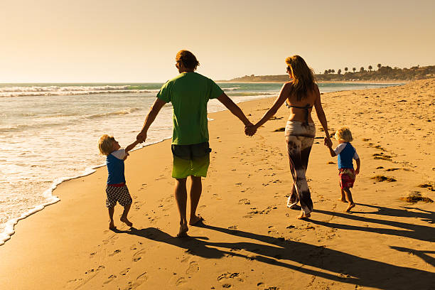 istock Beach Surfer Family 468191194