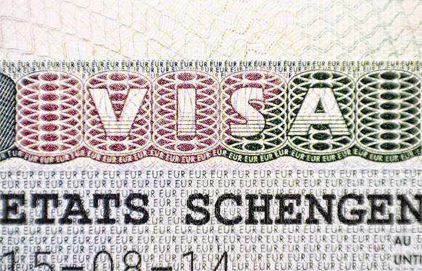 istock Close up Schengen visa in the passport 468193994