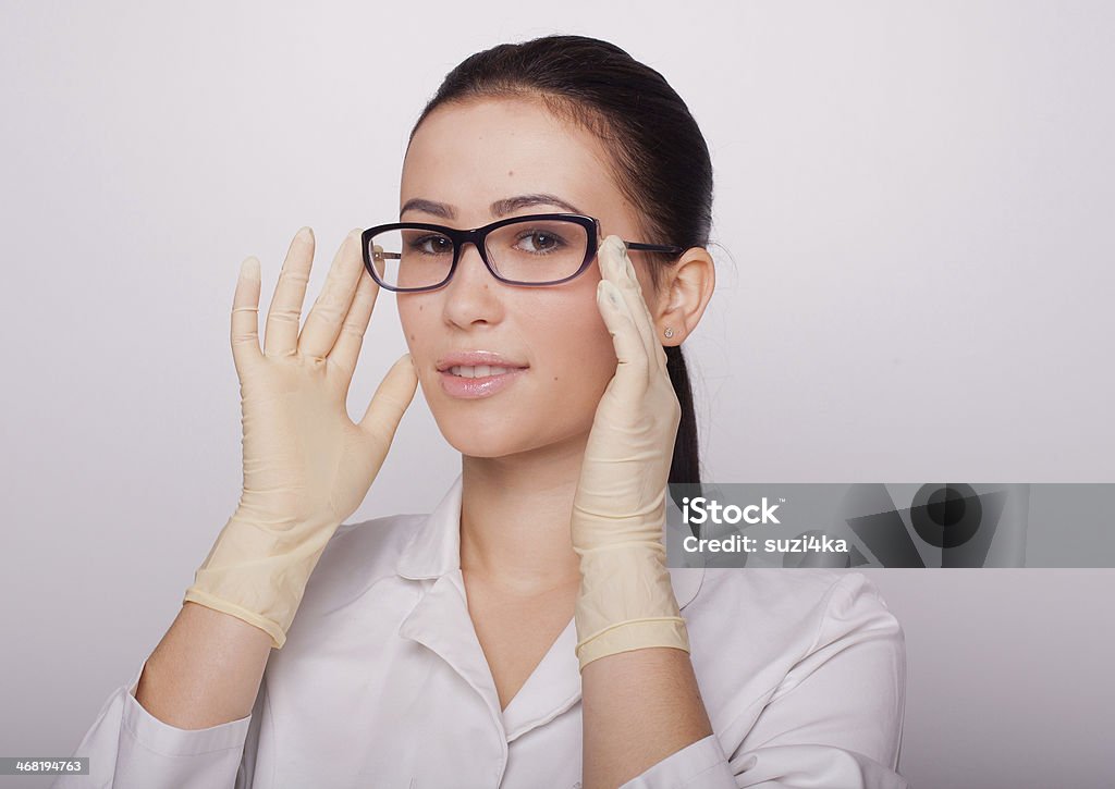 the beautiful and young doctor in a white dressing gown /file_thumbview/134217739/1 Adult Stock Photo