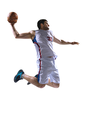 Isolated on white professional basketball player
