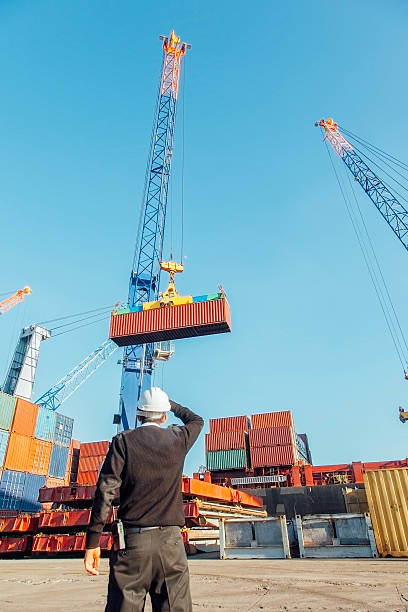 istock Shipping of containers and employee 468196674