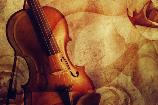 Violin on a romantic grunge background.