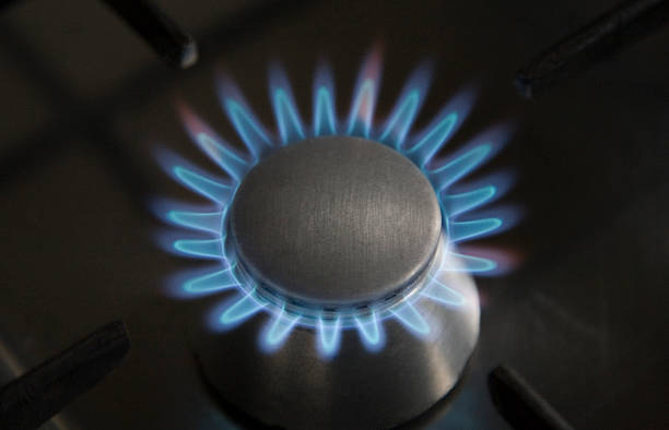 istock Middle sized Gas Burner Blue Flames Part of Kitchen Stove 468199284