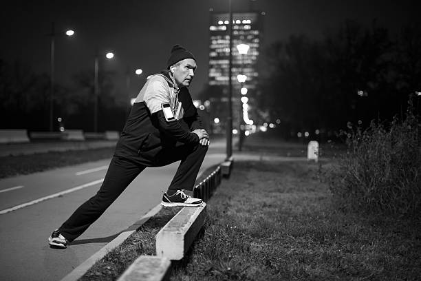istock Senior man running at night. 468203164