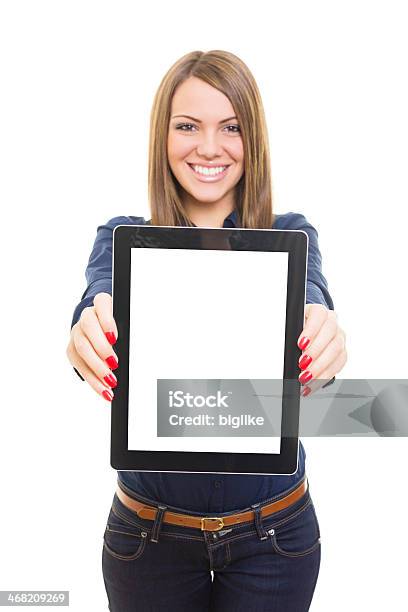 Joven Feliz Estudiante Mujer Mostrando Tableta Con Pantalla En Blanco Foto de stock y más banco de imágenes de 20 a 29 años