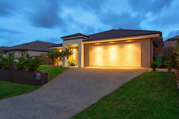 An exterior of an Arts and Crafts/Bungalow-style home. Taken early in the morning just after sunrise.