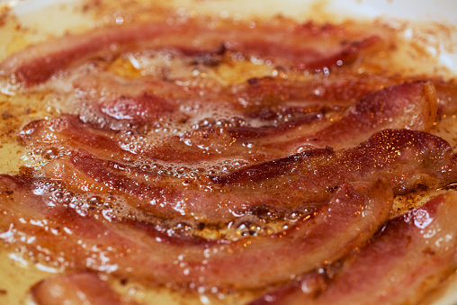Fresh bacon with meat and fat, isolated close-up