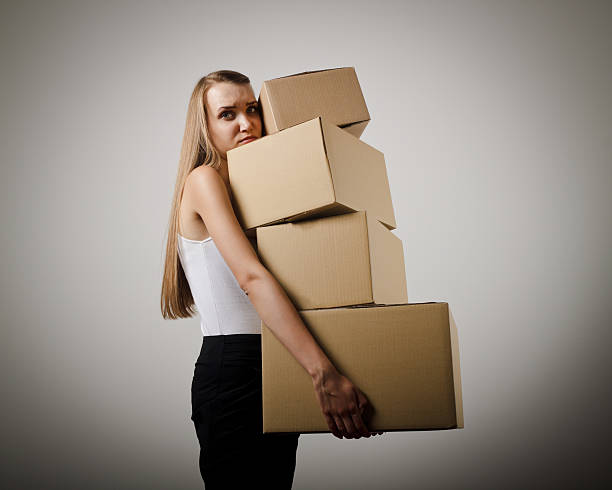 istock Woman and cardboards. 468217106