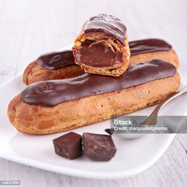 Chocolate Eclair Stock Photo - Download Image Now - Baked, Baked Pastry Item, Bakery