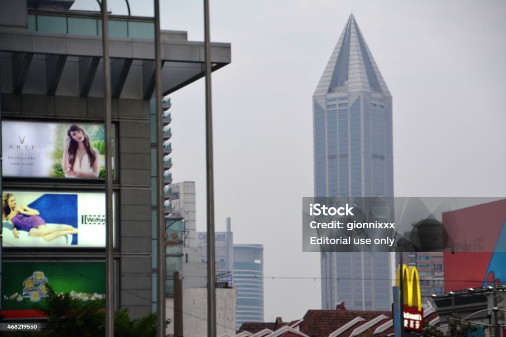 Shanghai Tomorrow Square cityscape, China Shanghai, China - May 12, 2014: Shanghai central district cityscape. In the background the postmodern Tomorrow Square building, the fifth tallest building in Shanghai, 285 m tall 2015 Stock Photo