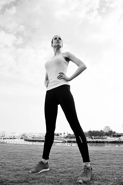 istock Young beautiful  woman jogging  on morning 468221521