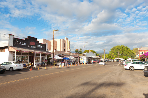 Hanapepe, Kauai, Hawaii, USA - Feb 27, 2015: Tourists and vacationers touring the small village town of Hanapepe on the Friday Night Festival and Art Walk.