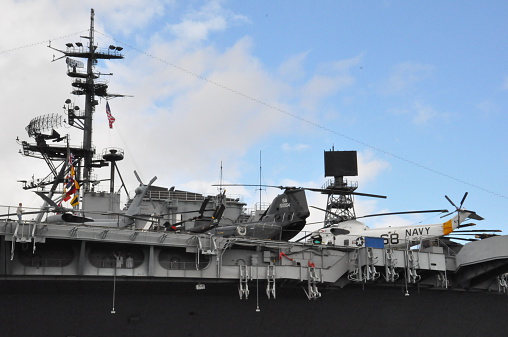 San Diego, CA, USA - December 19, 2013: USS Midway in San Diego, California. It is the only remaining U.S. aircraft carrier of the World War II era that is not an Essex-class aircraft carrier.