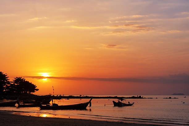istock Fishing boat and sunset 468228680