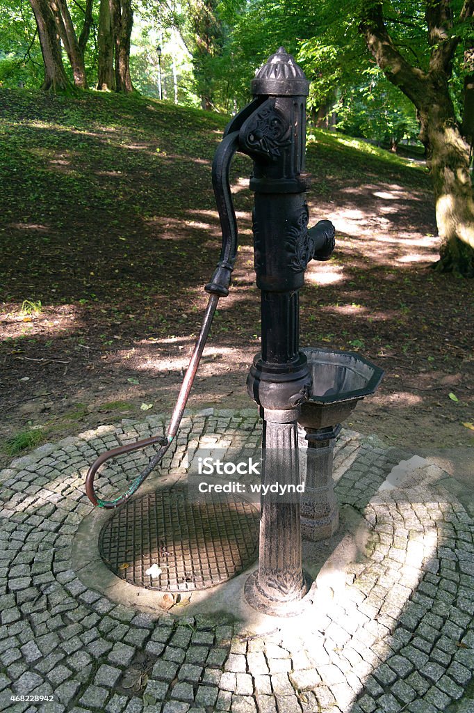 old handy well old handy well in the city park 2015 Stock Photo