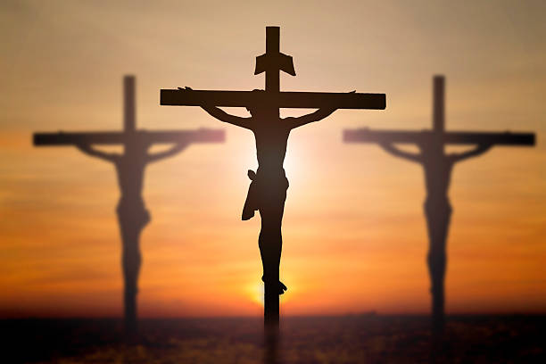 istock Jesus on cross with blur beautiful background 468241808