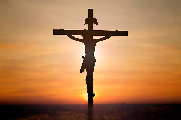 istock Jesus on cross with blur beautiful background 468241810
