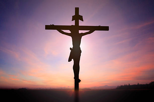 istock Jesus on cross with blur beautiful background 468241812