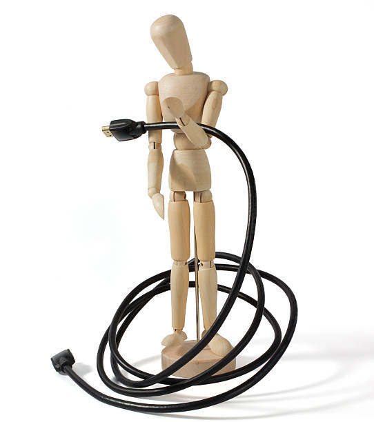 istock Wooden Mannequin With a Multimedia Cable 468243609