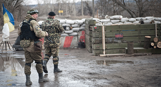 Shchastya, ATO zone, Ukraine - March 14, 2015: Soldiers going to take their position.