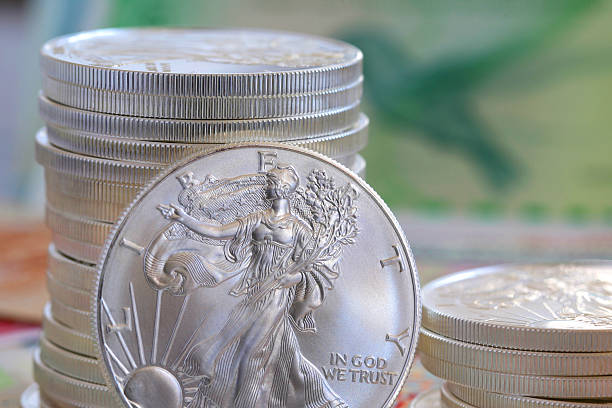 istock International currency and walking libery silver 468247810