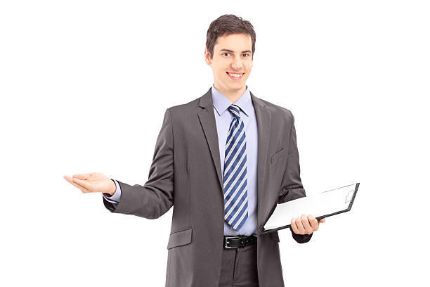 istock Young professional man holding a clipboard and gesturing with hand 468249133