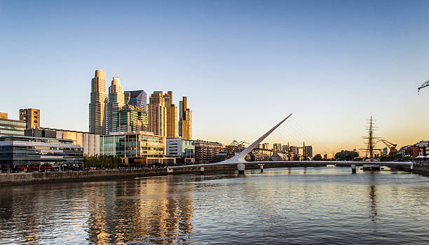Golden Hour at Puente de La Mujer, Puerto Madero This photo captures the beautiful golden hour in Puente de La Mujer in Puerto Madero, Buenos Aires. An unmissable place in the city of tango. Captured with Nikon 3100, iso 400. buenos aires stock pictures, royalty-free photos & images