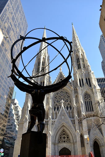 Picture from behind Atlas' statue at the Rockefeller center with ST. Patrick's cathedral across the street