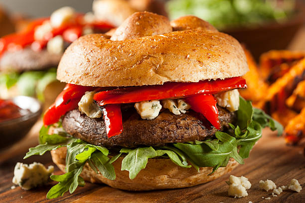 istock Portobello burger topped with arugula cheese and peppers 468260863