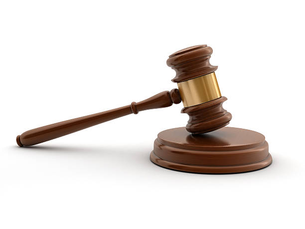 istock Brown gavel and sound block against a white background 468264636