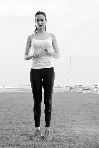 istock Young beautiful  woman jogging  on morning 468265659