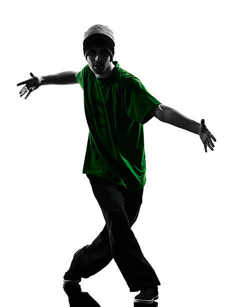 istock Partial silhouette of young man in hip hop pose 468266477