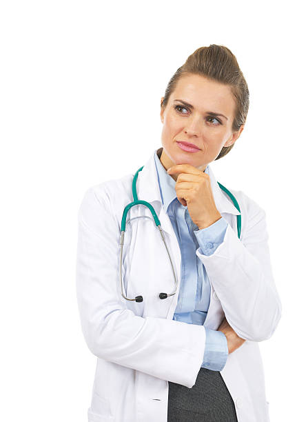 istock thoughtful doctor woman looking on copy space 468266719
