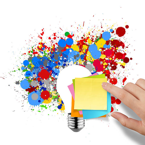 istock blank sticky note with splash colors lightbulb on white backgrou 468269965