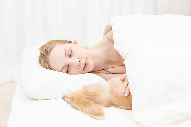 istock Young caucasian woman with dog 468270812