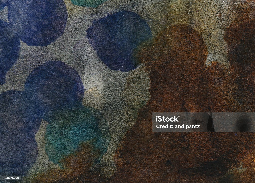 Watercolor background painted with dark earth tones A hand painted watercolor background. There is a spotted texture and prominent dark colors of blues, browns and gray. This texture would make a great background for a design. 2015 Stock Photo