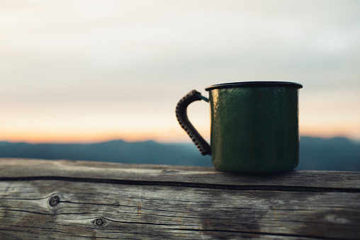 Cup on the background of mountains