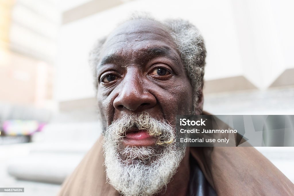 Homeless Person Los Angeles, California, USA- July 17, 2014: Afro american senior man in Los angeles Downtown Homelessness Stock Photo