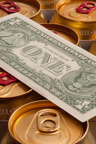 istock Cans of beer and US dollar 468276038