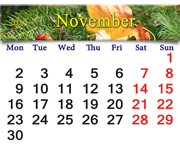 istock calendar for November of 2015 with leaf and spruce 468280942